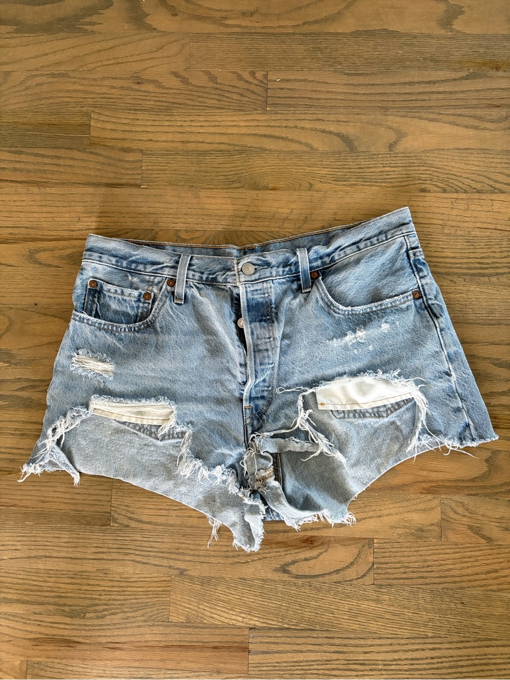 Levi’s 501 Button Fly Distressed Denim Cutoff Shorts